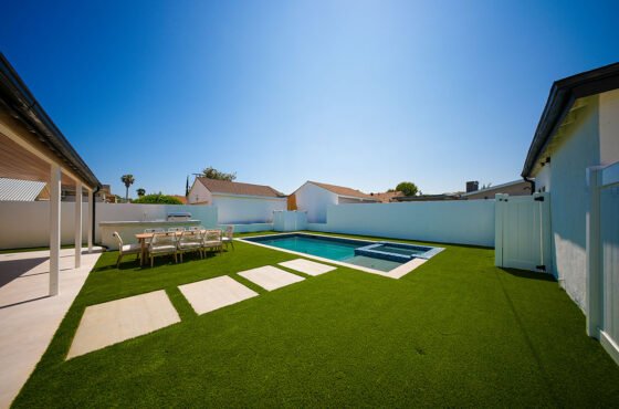 Why Backyard Design Around Pools Needs Walkway Planning